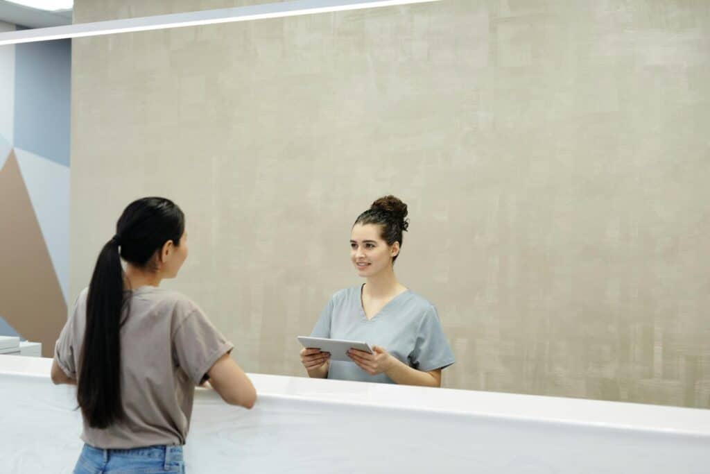 Patient being assisted at a MARS Healthcare partner imaging reception